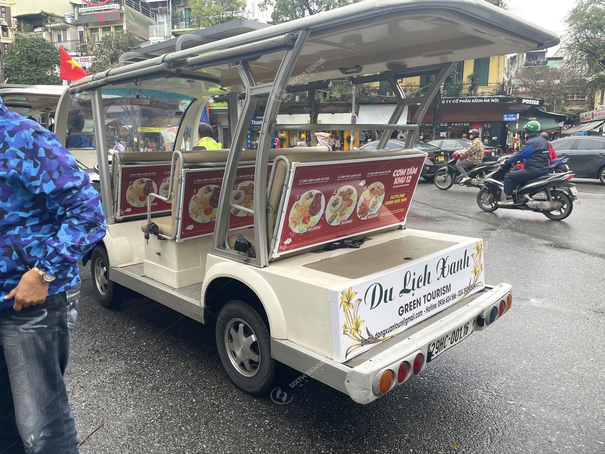 Quảng cáo trên xe ô tô điện Hà Nội về Cơm Tấm Khu 12